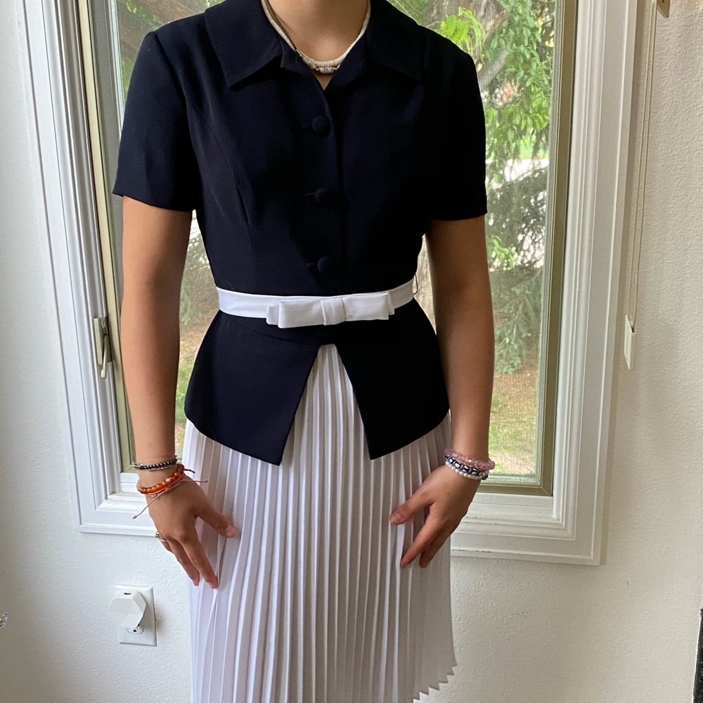 Blue Button up shirt with Midi pleated white skirt